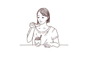 パフェを食べてる女性の線画イラスト